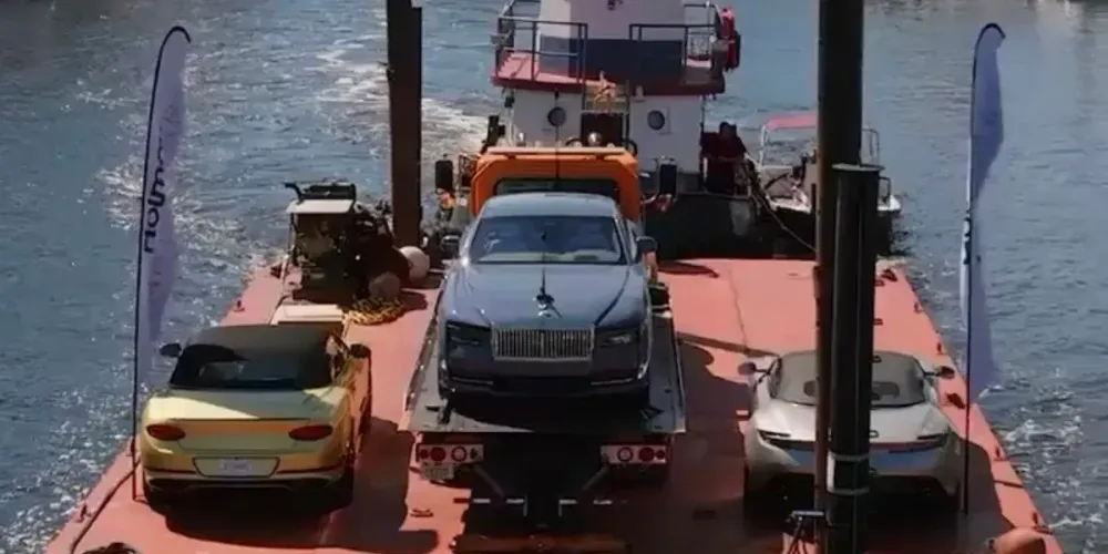 Watch Holman Motorcars & Denison Yachting Ferry Luxury Cars to a Mansion [In the News]